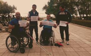 Инвалида-колясочника  поддержали коллеги и организовали флешмоб с лозунгом «Не загоняйте инвалида в  конуру»